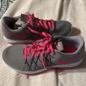 New in box Nike Girls Gray and Pink Flex Fury Shoes